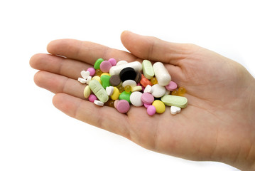 pills on female hand