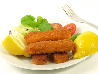 Fish fingers with vegetables, isolated