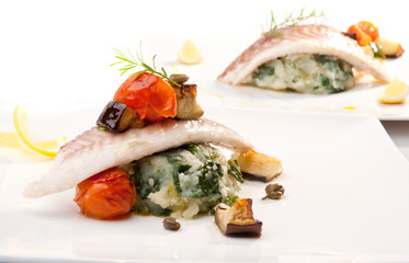 Fish  filet on potato with chard