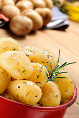Naklejka na ściany i meble Potatoes with rosemary and thyme