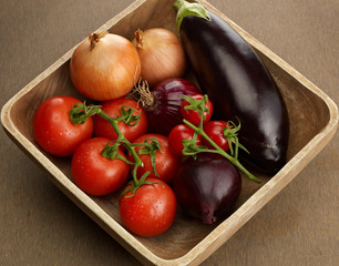 wooden bowl with  fresh vegetables