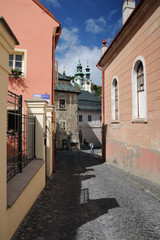 Historic street in Banska Stiavnica in background Old Castle