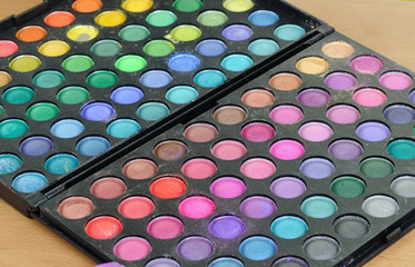 Makeup colorful eyeshadow palettes as background