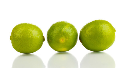 Fresh limes isolated on white