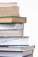 Pile of books isolated on white background