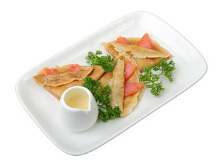pancakes with salmon and sauce