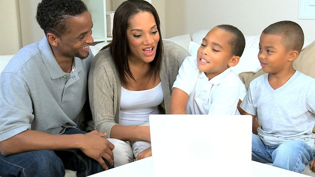 Young Family Talking Via Online Web Chat