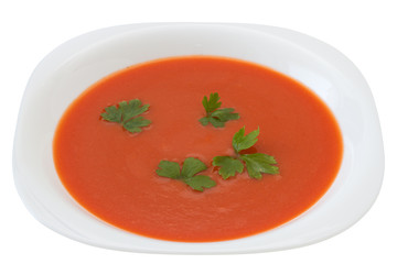 tomato soup with parsley on the plate