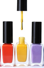 Group of bright nail polishes isolated on white
