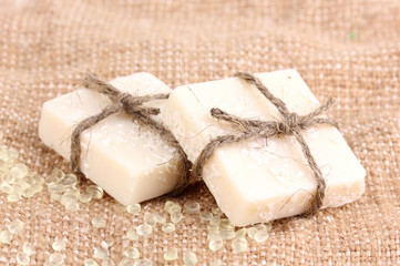 Fototapeta na wymiar Hand-made herbal soap on sackcloth