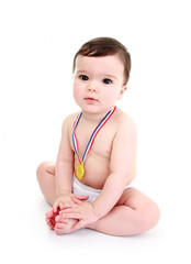 Baby wearing gold medal