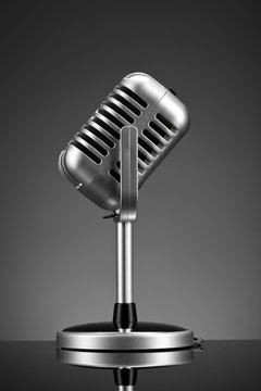 Retro microphone on grey