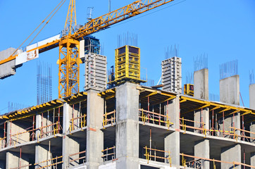 Concrete formwork and crane on construction site
