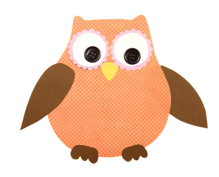 a paper cut out owl orange and brown