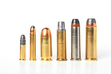 bullet- ammo size compare, isolated white. - obrazy, fototapety, plakaty