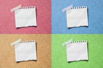 Fototapeta premium colorful note paper stick on wooden background.