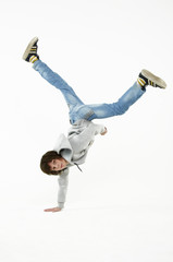boy dancing break dance on a white background