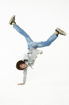 Boy Dancing Break Dance On A White Background