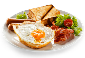 English breakfast - toast, egg, bacon and vegetables