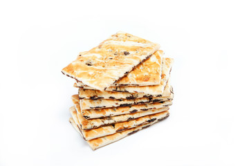 A stack of cookies with caramel filling on a white background.