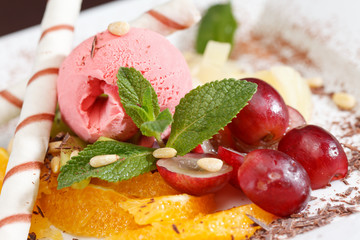 tasty dessert with ice cream and fruits