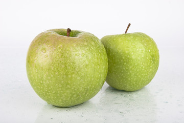 Fresh Juicy Green Apples on white