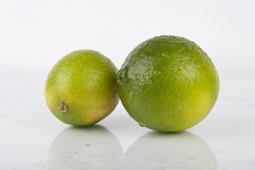 Fresh Juicy Limes on white