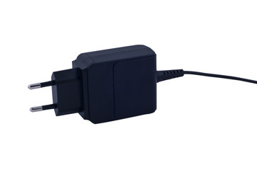 Power adapter and cord on isolated white background
