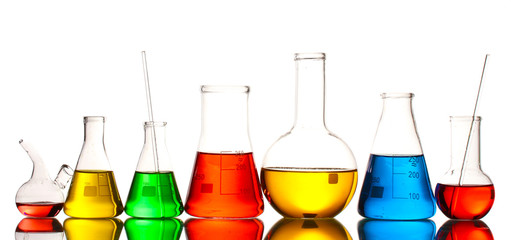 Different laboratory glassware with color liquid and with