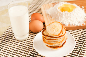 Home pancakes with sour cream, flour and eggs