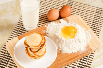 Home pancakes with sour cream, flour and eggs
