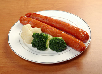 Sausages with broccoli and cauliflower