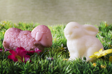 animals shape soaps on flowering garden