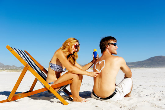suncare beach couple