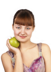 Young cute woman holding an apple