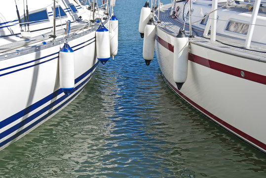 Colorful motorboats on calm water