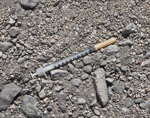 Drug Junkie Needle in the Dirt