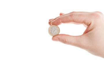 Female hand holding an euro coin