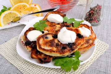 Fried pancakes with blackcurrant