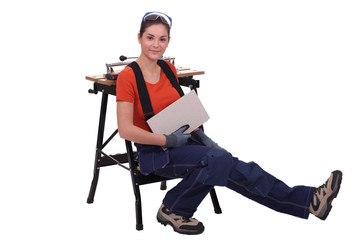 Woman cutting tiles