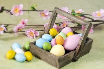 Naklejka na ściany i meble easter eggs on a wood basket