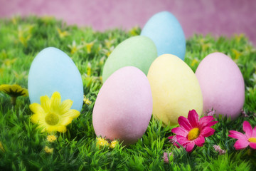 easter eggs on a flowering garden