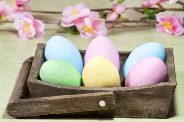 easter eggs on a wood basket