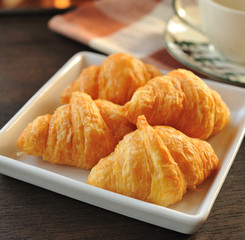 breakfast with croissants and coffee