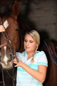 juvenile blonde with horse