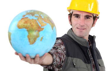 Workman with globe in hand