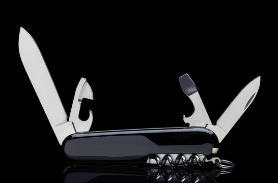 Swiss army knife isolated on black