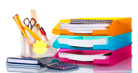 bright paper trays and stationery isolated on white