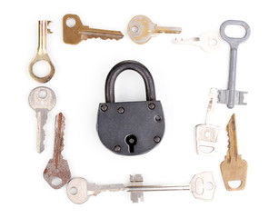 Metal keys and padlock isolated on white