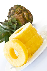 peeled slices of pineapple